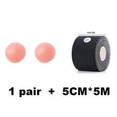 A pair of round, skin-tone nipple covers beside a roll of 5CM*5M black Breast Lift Tape labeled with the product name: 1 Roll 5M Women Breast Nipple Covers Push Up Bra Body Invisible Breast Lift Tape Adhesive Bras.