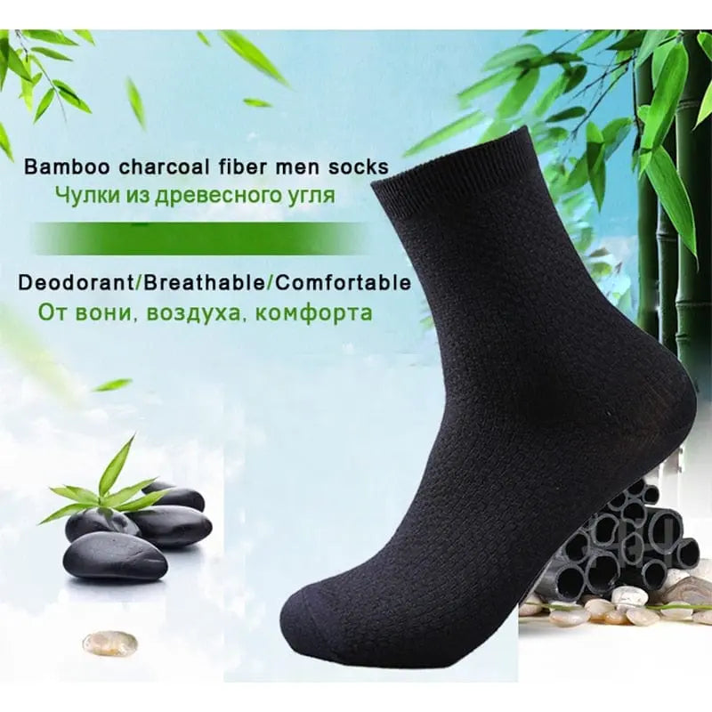 The 10 Pairs/Lot Men's Bamboo Fiber Socks in black (sizes 42-45) are shown with bamboo, stones, and charcoal. Text in English and Russian highlights their deodorant, breathable, and comfortable features for business wear.
