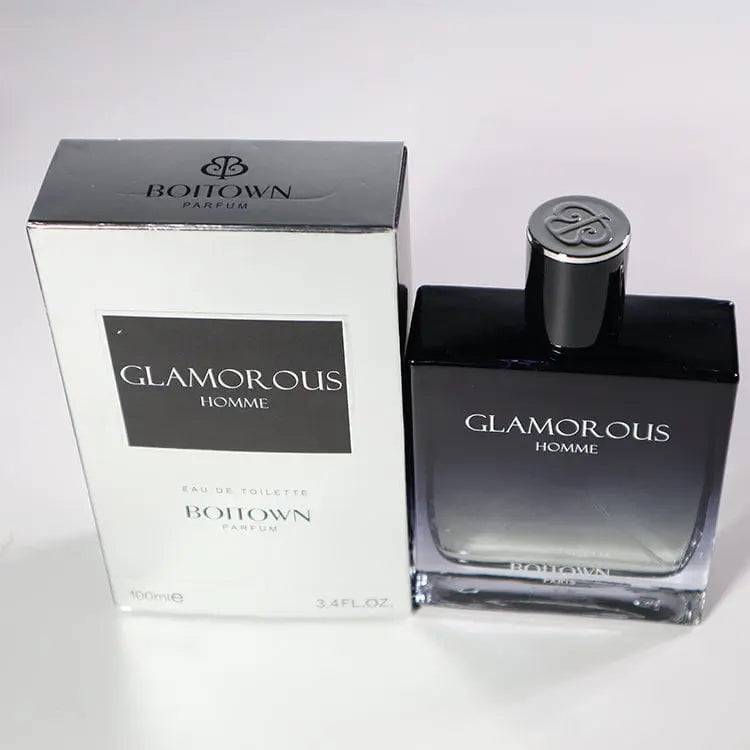 A 100ML OEM/ODM EDP men’s perfume with long-lasting fragrance comes in black and white packaging with silver accents, and the bottle has a decorative silver cap.