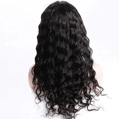 Back view of a long, black human hair wig with a wavy texture on a mannequin head.