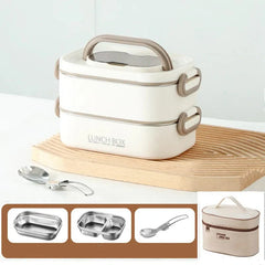 A white double-layer stainless steel lunch box with a matching insulation bag and spoon.
