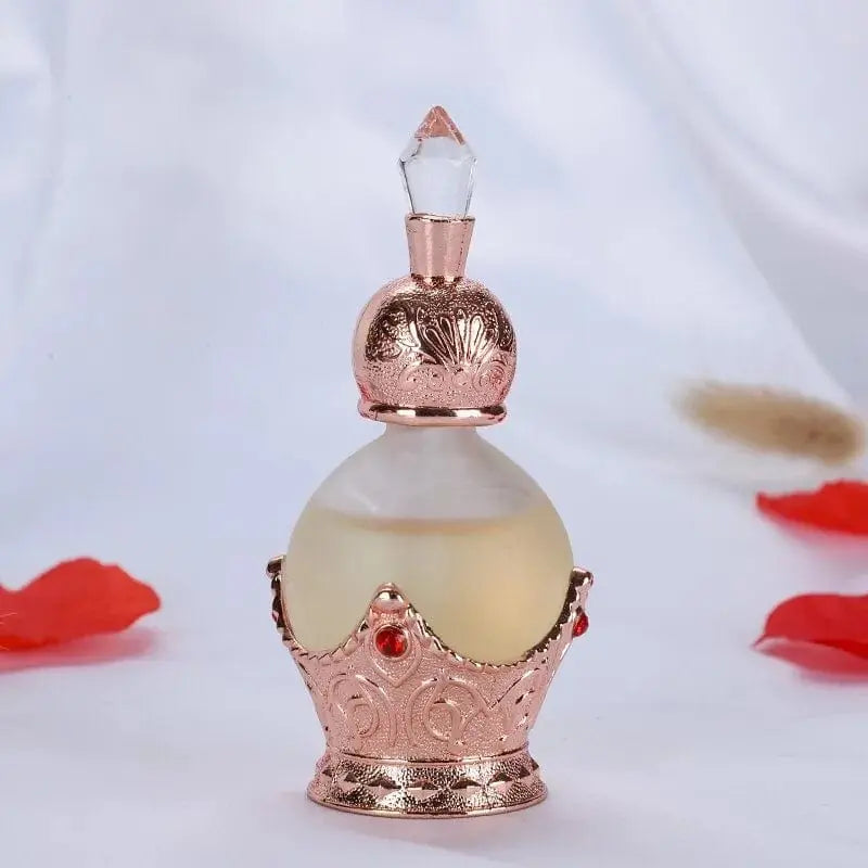 The 15ml oil perfume features a fresh, elegant, long-lasting fragrance in a frosted glass bottle with a rose gold crown-shaped base and crystal-like stopper—crafted for beauty and reliability, perfect for a beautiful, fragrant life.