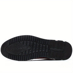 The black rubber outsole of a men's casual shoe features a textured tread pattern for grip.
