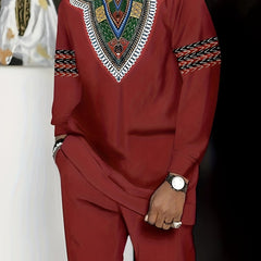 A man wears a red long-sleeved African-inspired suit with a patterned chest and sleeve design.
