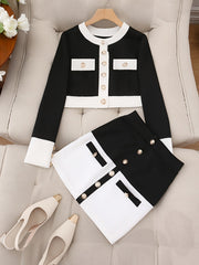 A black and white color block two-piece set featuring a long-sleeve jacket and skirt with buttons.