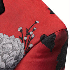 A red blazer featuring a black and white floral motif pattern with a lapel collar.