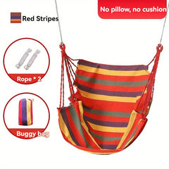 A red striped canvas hammock chair hangs with two ropes and a matching storage bag.