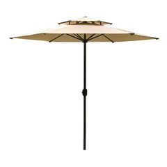 A tan outdoor patio umbrella with a two-tier canopy and a black pole.