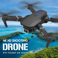 A black 2022 E88Pro RC Drone with a 4K and 1080P wide-angle HD camera captures aerial photos over tropical islands and blue water. Text reads: Foldable WiFi FPV RC Helicopter – Height Hold – Professional Gift Toy.
