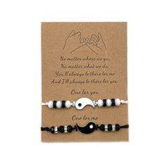Two matching 2022 New Best Friend Yin Yang adjustable cord bracelets for friends or couples on a card with a pinky promise drawing and the message: “No matter where we go… I’ll always be there for you. One for you, One for me.”.