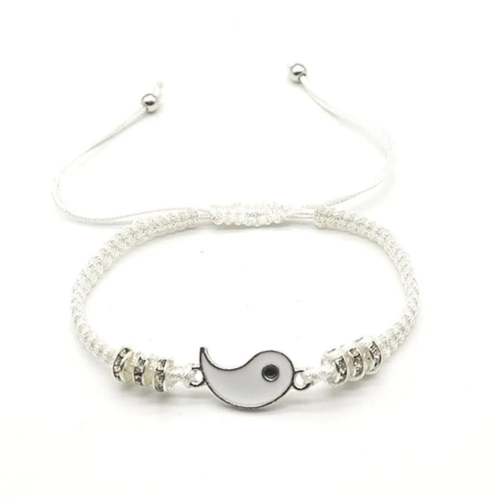 The 2022 New Best Friend Bracelets for 2 are matching Yin Yang adjustable cord bracelets, perfect for BFFs or couples, featuring a central fish-shaped charm and silver rings—an ideal fashion jewelry piece for friendships or relationships.
