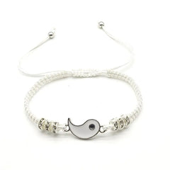 The 2022 New Best Friend Bracelets for 2 are matching Yin Yang adjustable cord bracelets, perfect for BFFs or couples, featuring a central fish-shaped charm and silver rings—an ideal fashion jewelry piece for friendships or relationships.