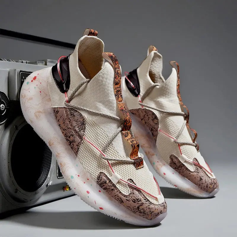 The 2022 Top Sale Fashion Sneaker features stylish beige and brown high-tops with unique patterns, transparent outsoles, and a breathable, lightweight design. Displayed on a gray surface with a minimalist neutral background next to a silver boombox.