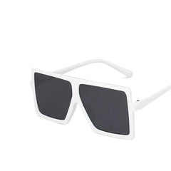 Oversized square sunglasses for children featuring a white plastic frame and dark lenses.
