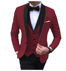 A burgundy three-piece suit featuring a black shawl lapel, vest, and matching trousers.