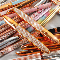 A collection of decorative eyeliner glue pens adorned with sparkling rhinestones.