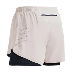 Light beige two-in-one men's running shorts with a black inner liner and a back zipper pocket.