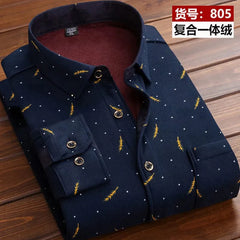 A navy blue long-sleeve button-down shirt with a yellow leaf and white dot pattern and a red fleece lining.