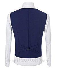 A back view of a navy blue slim fit suit vest worn over a white long-sleeved dress shirt.