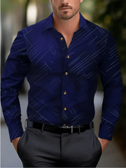 A man wears a long-sleeved navy blue button-down shirt with a subtle geometric line pattern.