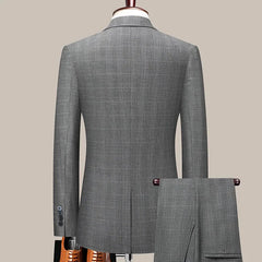A grey checkered two-piece suit for men featuring a single-breasted jacket and matching trousers.