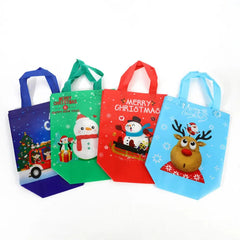Four colorful non-woven Christmas gift bags featuring cartoon snowman and reindeer designs.