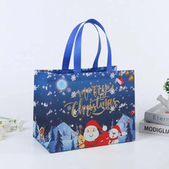 A blue non-woven Christmas gift bag featuring a cartoon Santa, snowman, and elk print.