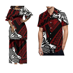 A woman in a ruffled sleeve maxi dress and a man in a short-sleeve shirt with matching tribal print.