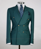 A slim fit emerald green double-breasted blazer with a wide shawl lapel and gold buttons.