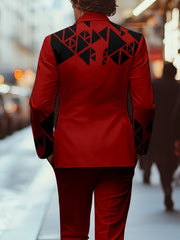 A red slim-fit suit jacket featuring black geometric triangle patterns on the shoulders and sleeves.
