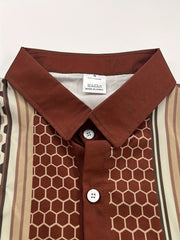 A brown and beige geometric honeycomb print shirt with a lapel collar and button-down front.