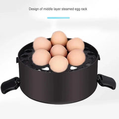 A black circular steaming rack holding seven eggs inside a portable electric lunch box.