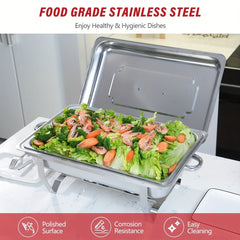 A rectangular stainless steel chafing dish filled with a salad of lettuce, shrimp, and carrots.