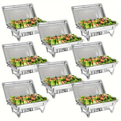 A set of eight stainless steel rectangular chafing dishes filled with salad.