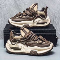 A pair of brown and beige chunky-soled casual sneakers with lace-up closures.