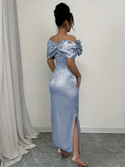 A woman wears a light blue off-shoulder bodycon maxi dress with a side slit.