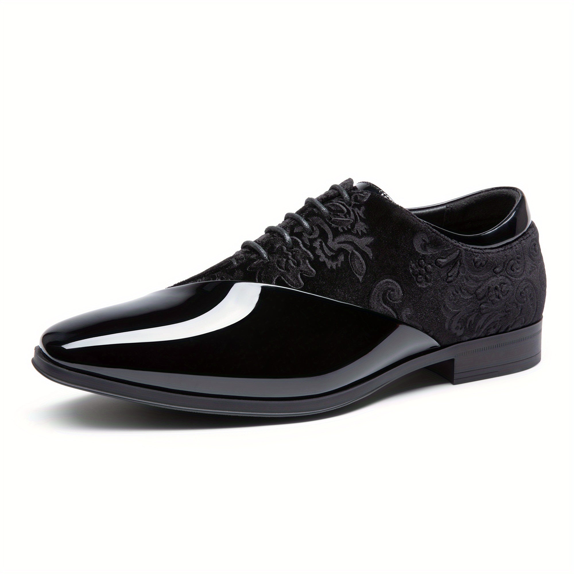 A black men's dress shoe featuring a glossy patent leather toe and a patterned velvet upper.