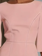 A light pink midi-length bodycon dress featuring a crew neckline and half sleeves.
