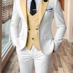 A slim fit three-piece wedding suit featuring a white jacket and trousers with a yellow vest.