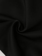 Black polyester fabric with a textured weave, shown in a swirl.