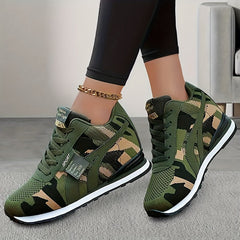 Women's camouflage pattern high-top sneakers with lace-up closures and white soles.