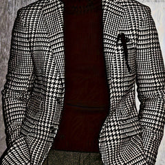 A men's regular fit blazer featuring a classic black and white houndstooth pattern.