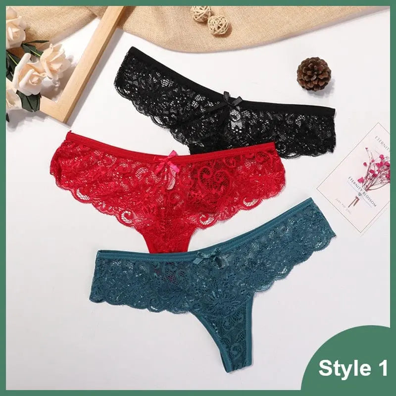Three pairs of 3 Pcs Woman Panties Sexy Lace Thong Underwear (black, red, teal) are displayed on a white surface with decorative accents; the image is labeled Style 1 in the corner.