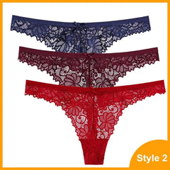 The 3 Pcs Woman Panties Sexy Lace Thong set features navy blue, dark burgundy, and red low-waist G-strings with floral lace and a bow on the waistband, displayed stacked against a white background.