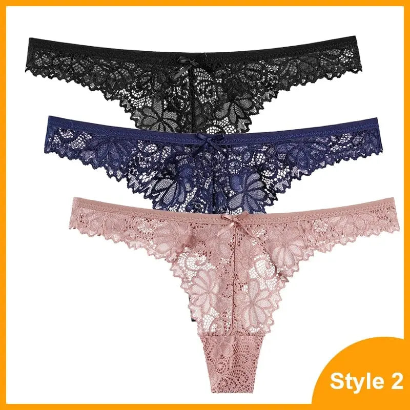 Three 3 Pcs Woman Panties Sexy Lace Thong Underwear in black, navy blue, and blush pink are stacked on a white background with an orange border. These low-waist transparent G Strings combine style and comfort. “Style 2” appears in the bottom right corner.