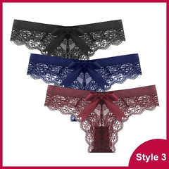 Set of three low-waist lace thong panties with large satin bows in black, navy blue, and burgundy, stacked together. “Style 3” is displayed at the bottom right on a pink border. Product: 3 Pcs Woman Panties Sexy Lace Thong Underwear.