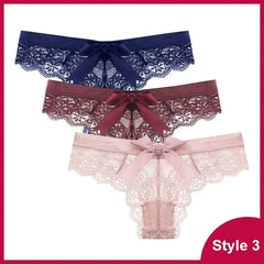 Set of three low-waist women’s lace thong panties in navy blue, burgundy, and light pink, each with a large satin bow. Features transparent G-string T-back design for a sexy look. “Style 3” shown at the bottom right corner.