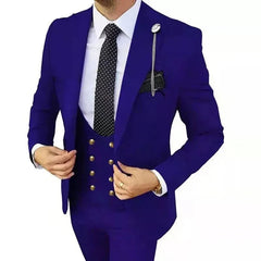 A man wears a slim-fit royal blue three-piece suit with a polka dot tie and gold buttons.