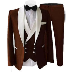 A brown three-piece slim fit suit featuring a white shawl lapel, vest, and black bow tie.