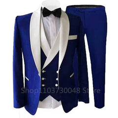 A royal blue three-piece suit featuring a white shawl lapel jacket, matching vest, and trousers.